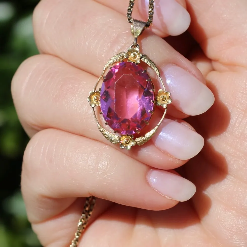 Circa 1930s-1950s Pink Paste Pendant in Decorative 9ct Gold Floral Surround, 4.23g