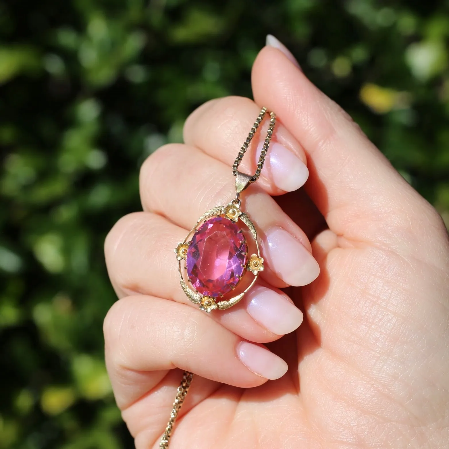 Circa 1930s-1950s Pink Paste Pendant in Decorative 9ct Gold Floral Surround, 4.23g