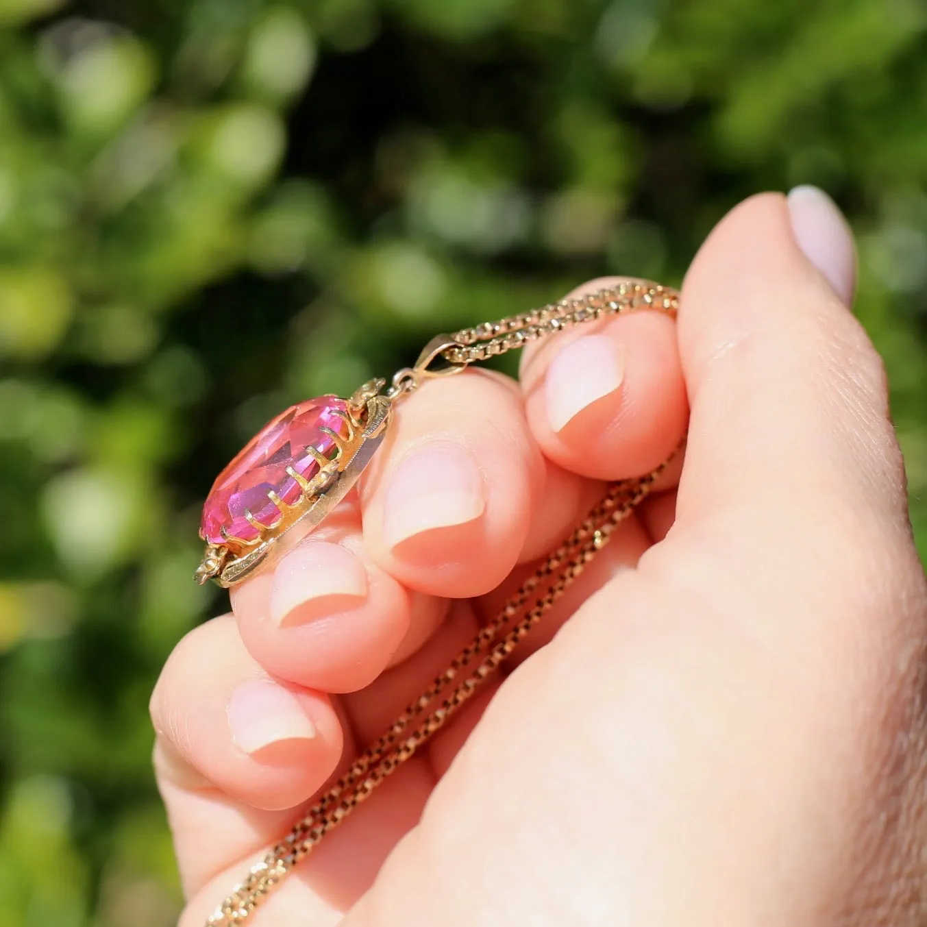 Circa 1930s-1950s Pink Paste Pendant in Decorative 9ct Gold Floral Surround, 4.23g