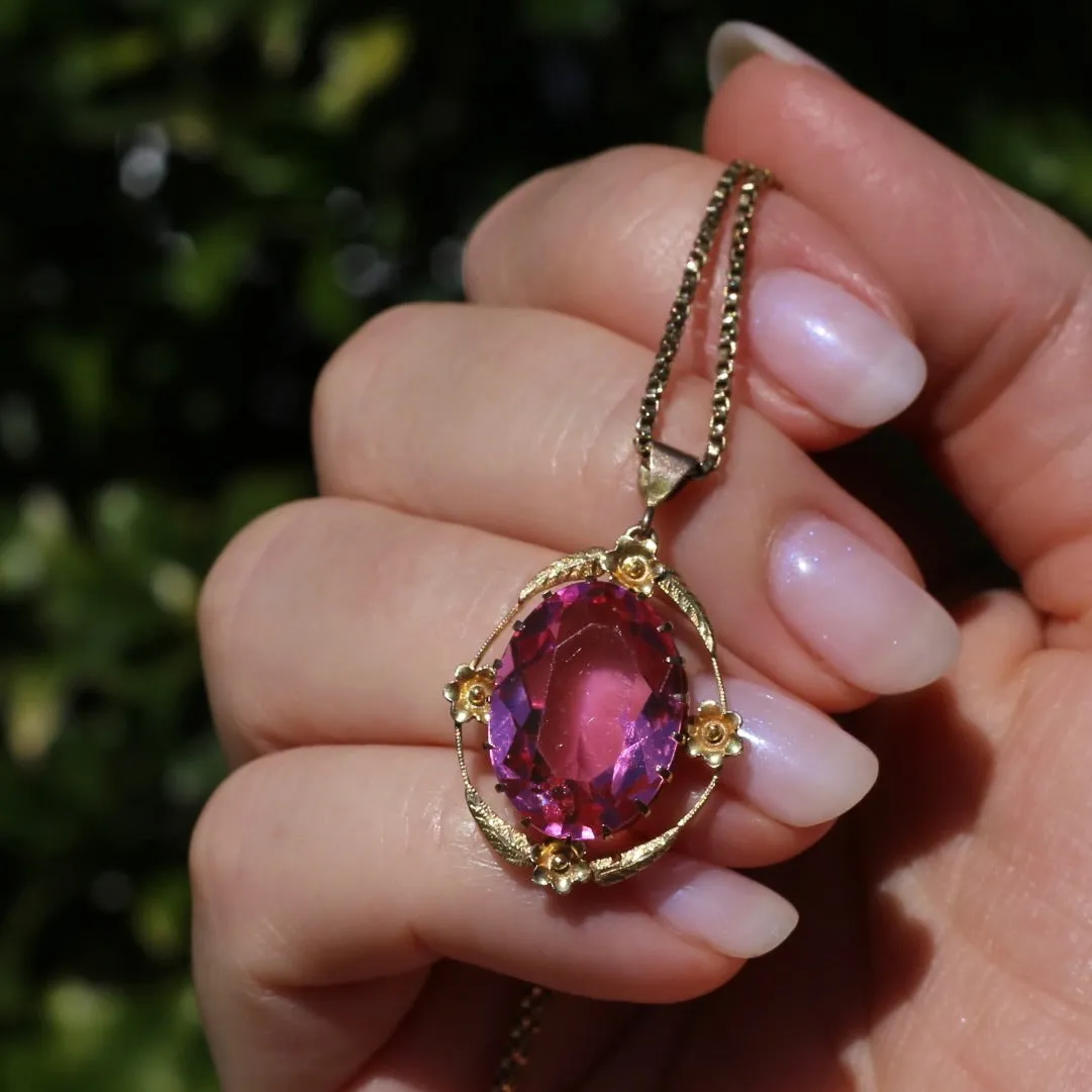 Circa 1930s-1950s Pink Paste Pendant in Decorative 9ct Gold Floral Surround, 4.23g