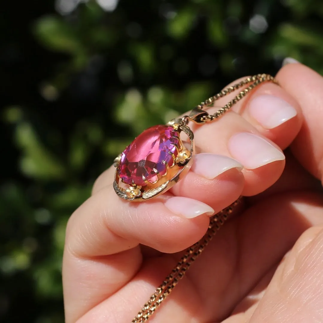 Circa 1930s-1950s Pink Paste Pendant in Decorative 9ct Gold Floral Surround, 4.23g