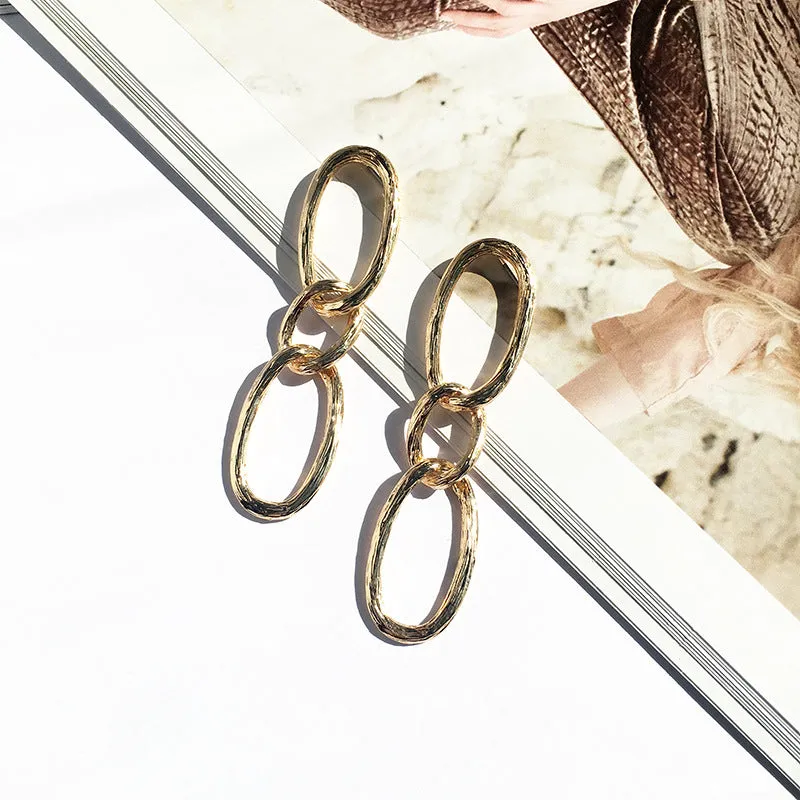 Golden Chain Style Drop Earrings with Creative Design