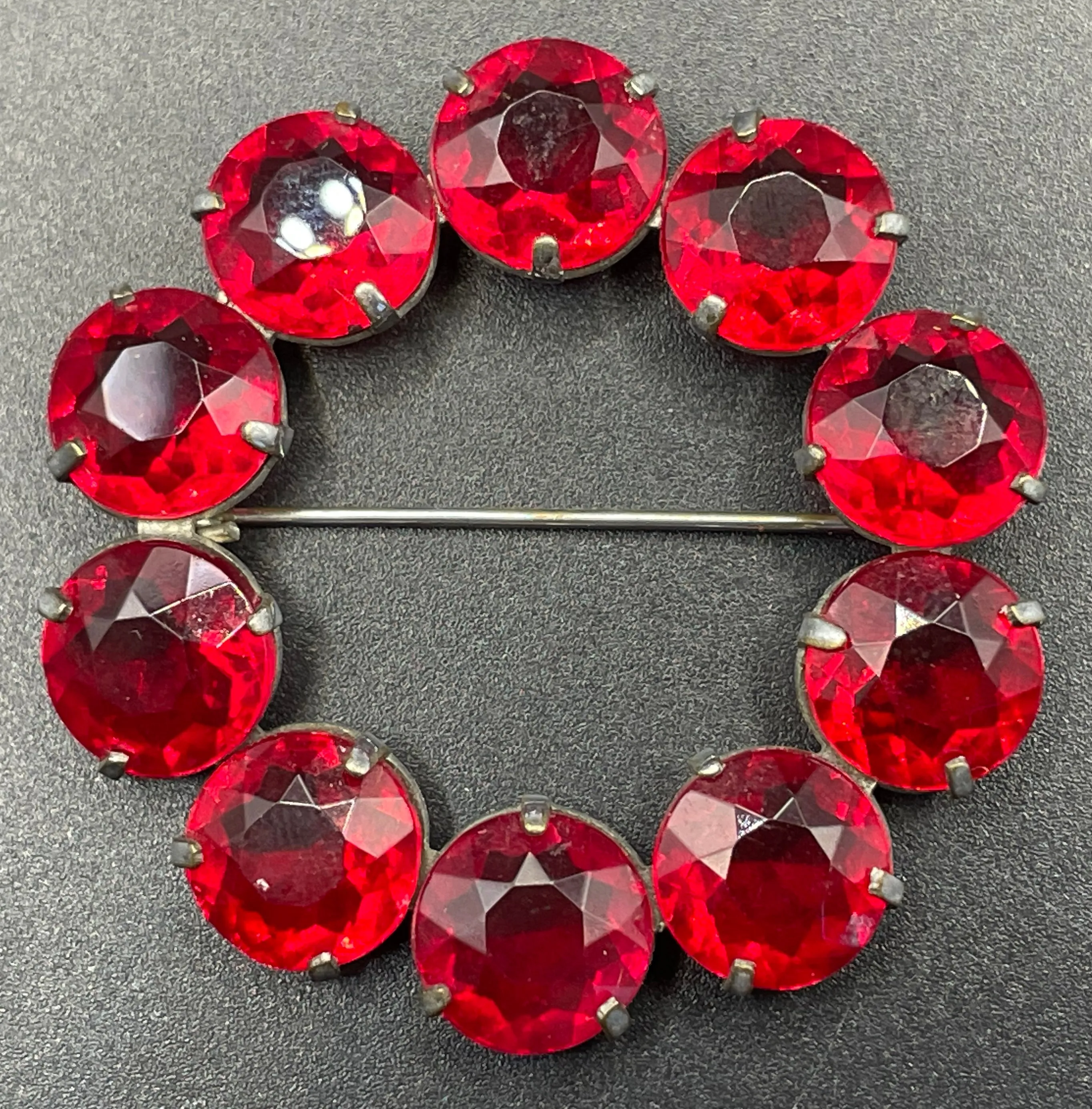 Vintage Art Deco bezel set gorgeous vibrant ruby red crystal riviere circle brooch, open-backed rhinestones in silver tone (Copy)